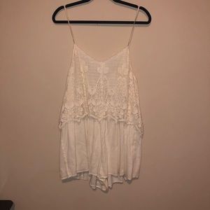 American Eagle cream flowy romper with lace detail